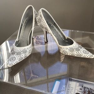 BCBGirls White patent leather cut out pumps